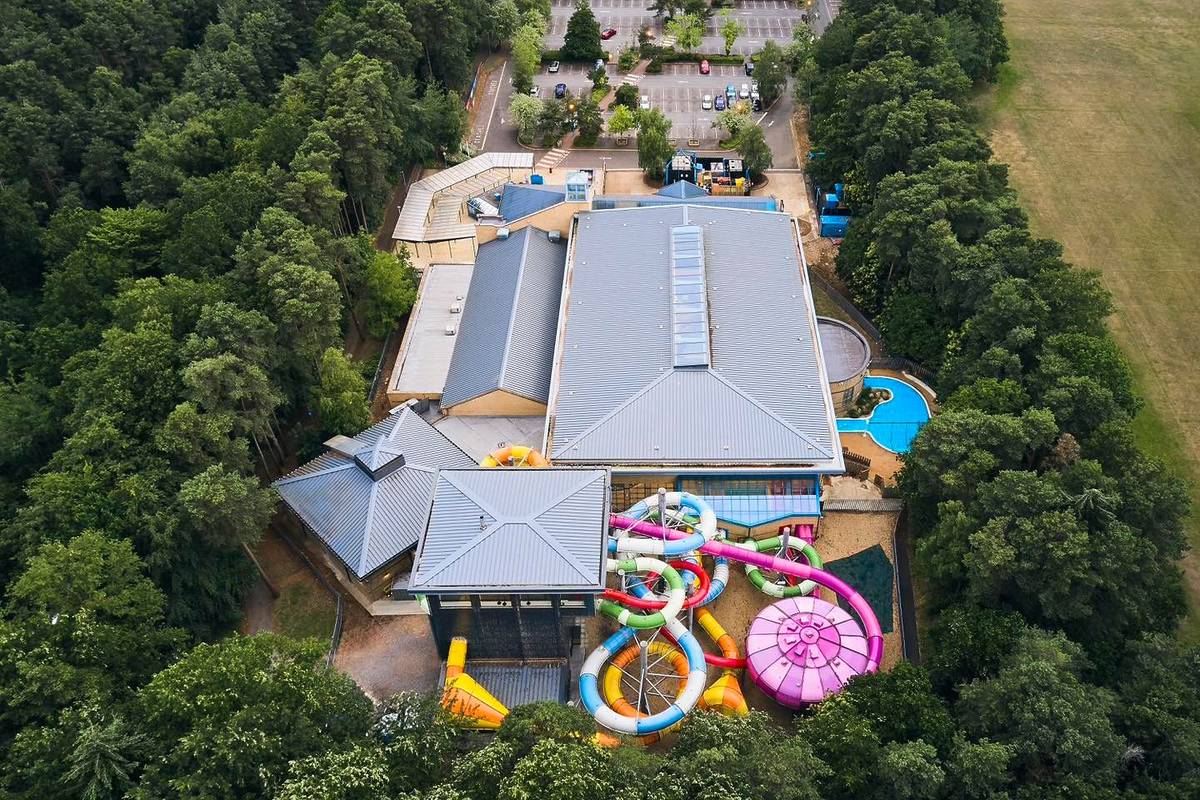 This incredible interactive water park near London is one of the largest in the country – and it boasts 5 thrilling slides, a huge pirate ship, and an erupting volcano